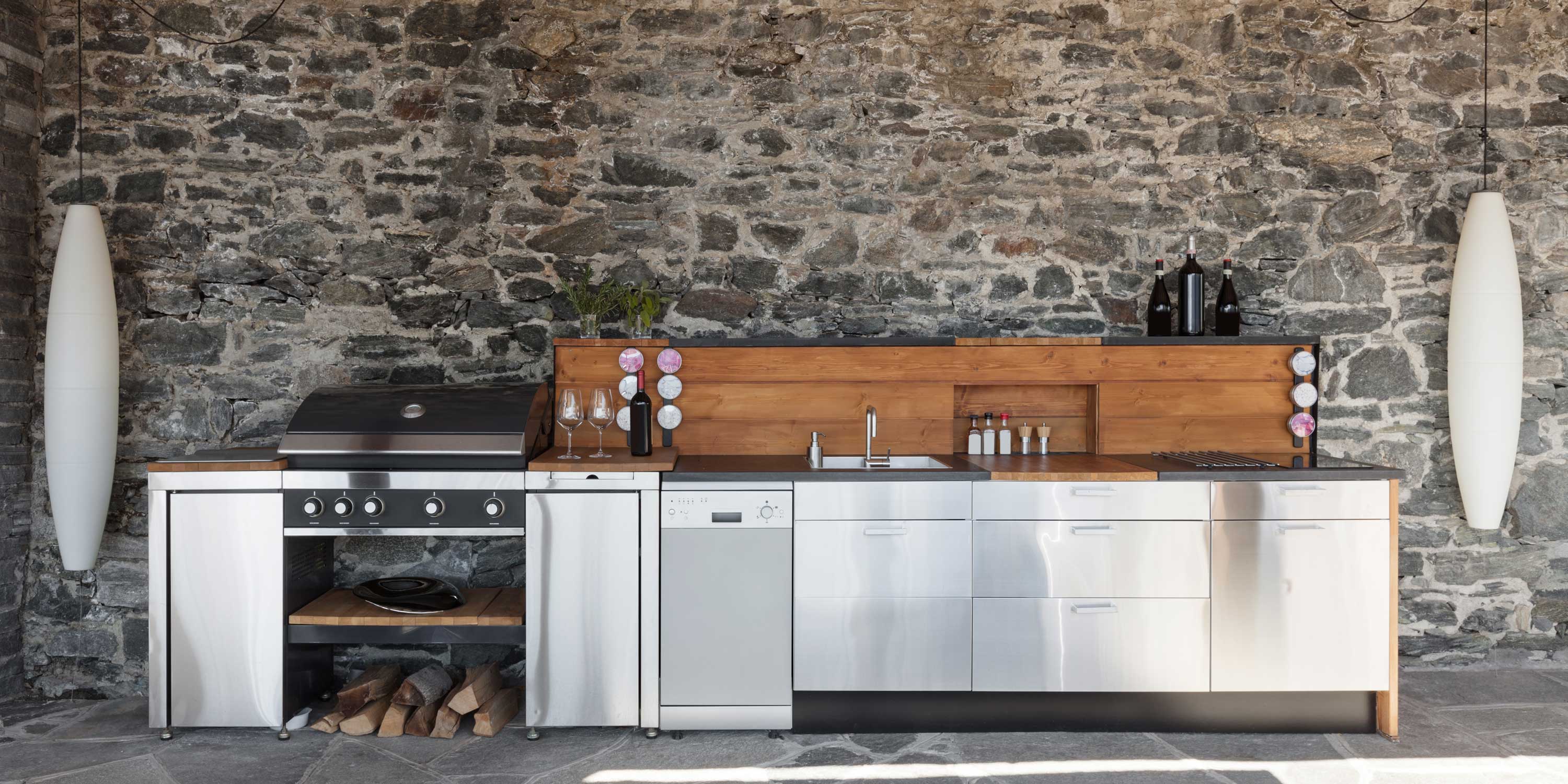 Kitchen on patio, stainless steel in front of stone