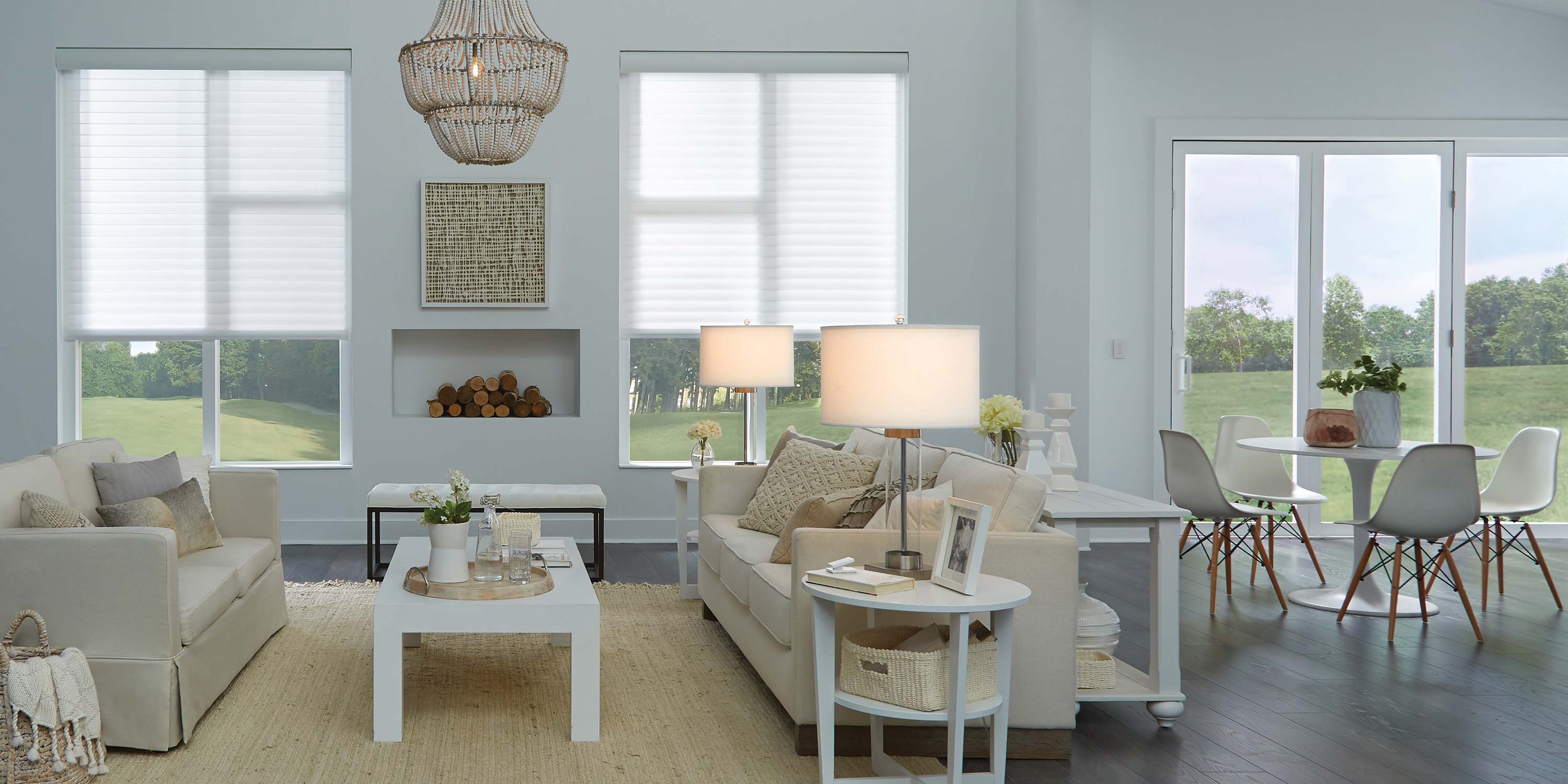blue grey walls with large windows and furniture