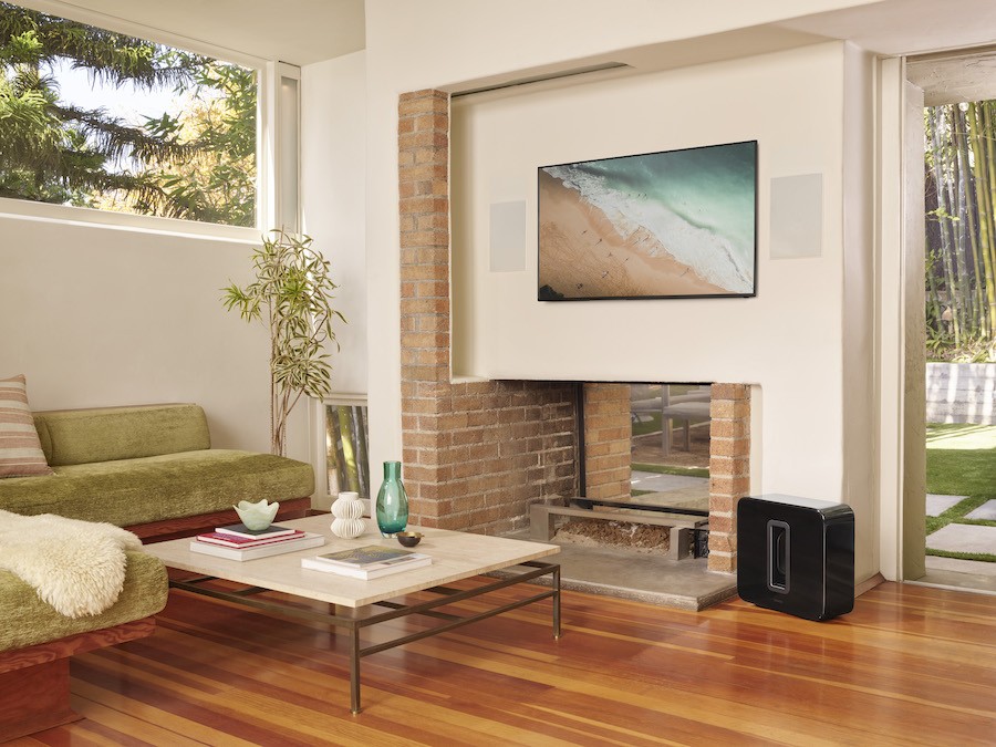 Beautiful living room equipped with Sonos in-wall speakers.