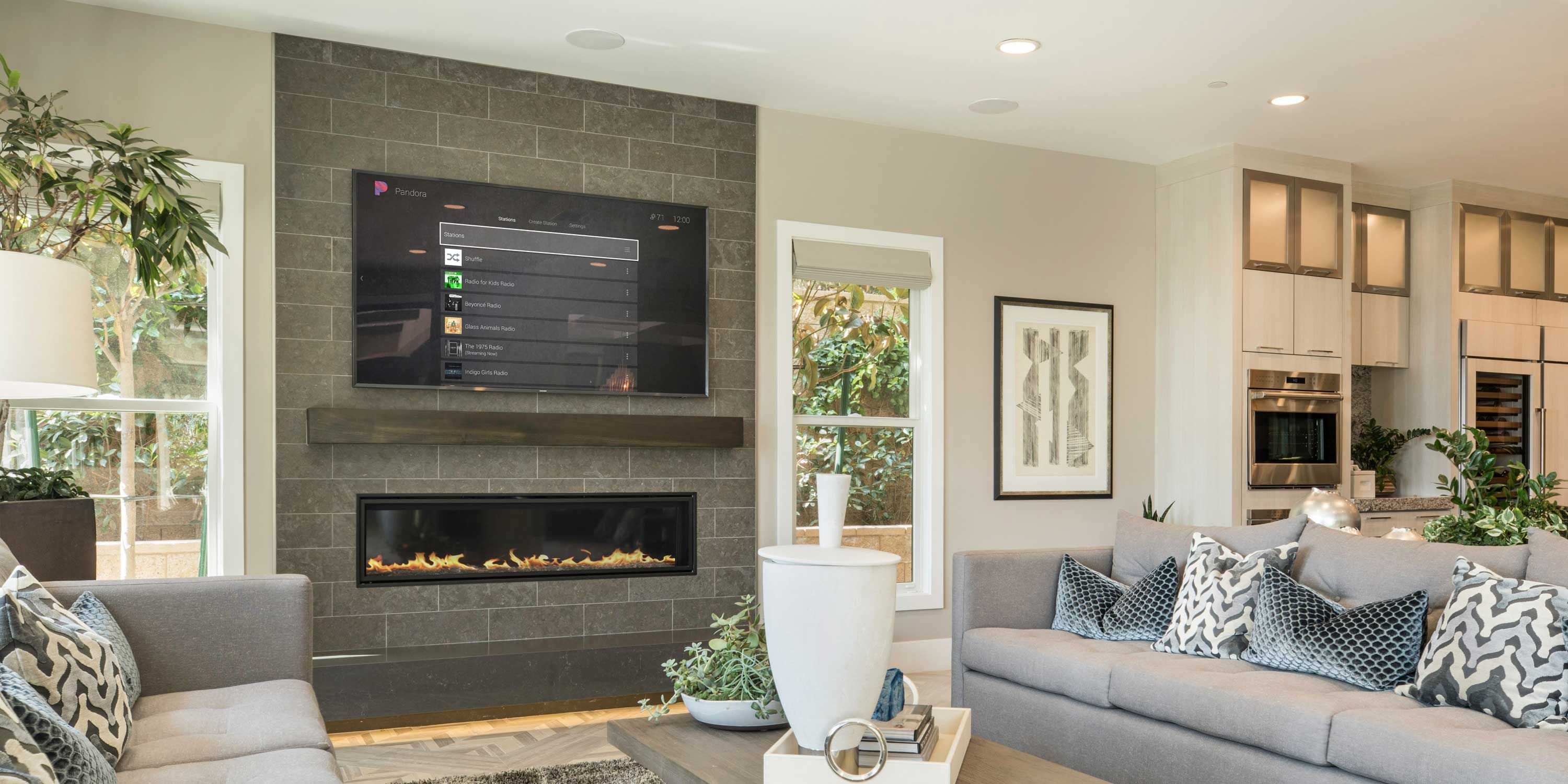 living room, control4, tv on wall motorized window treatments
