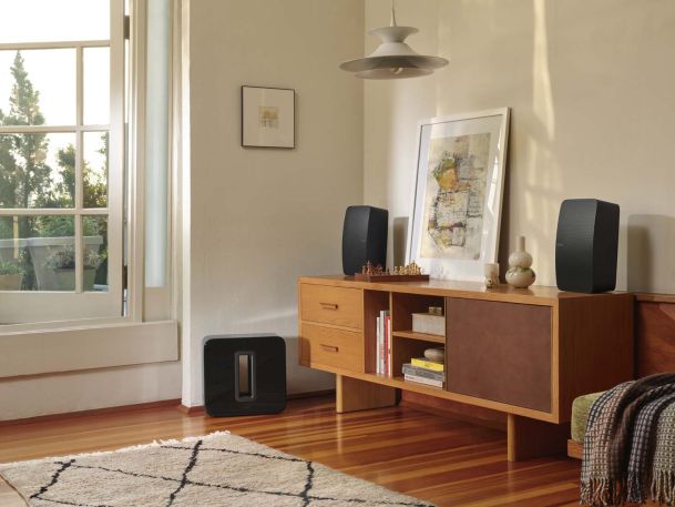 sonos speakers on wooden furniture